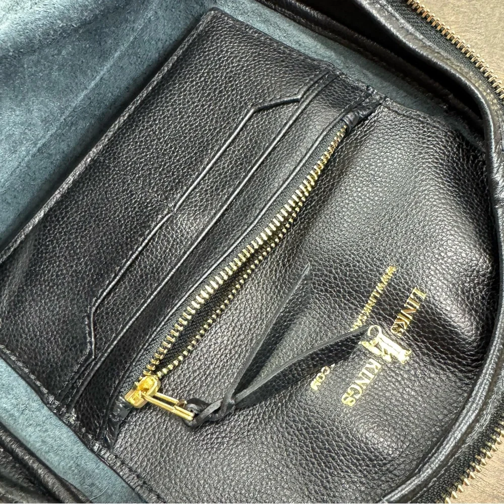 Classic Black Leather Backpack with Gold Hardware